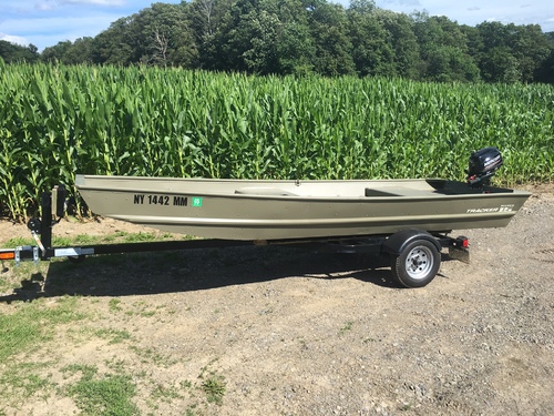 Brand new 1552 tracker Jon boat, trailer and 5 hp Mercury 